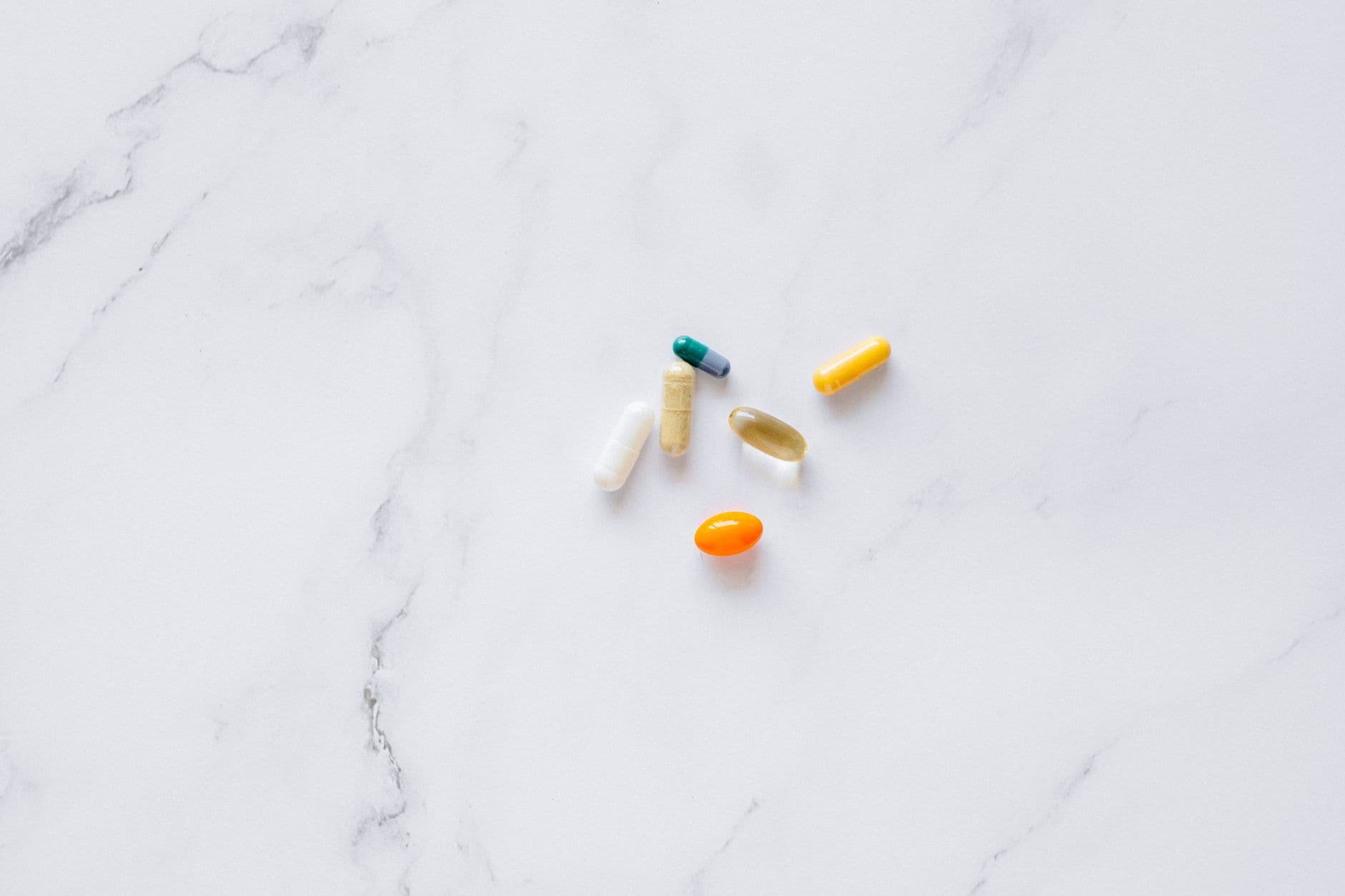 GOMAXXX capsules on a dark background